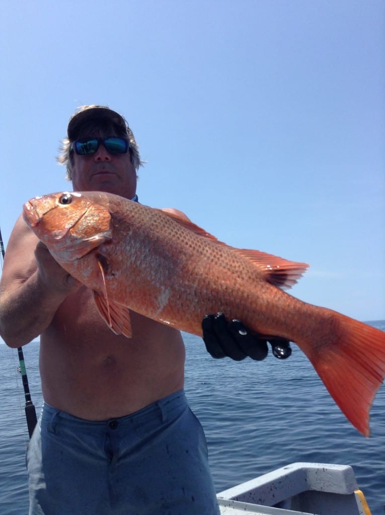 gregg with his grouper caught light gear jigging in panama