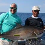 josh with the large amber jack he caught fishing in panama