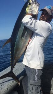 captain alex with tuna caught while on panama day charter