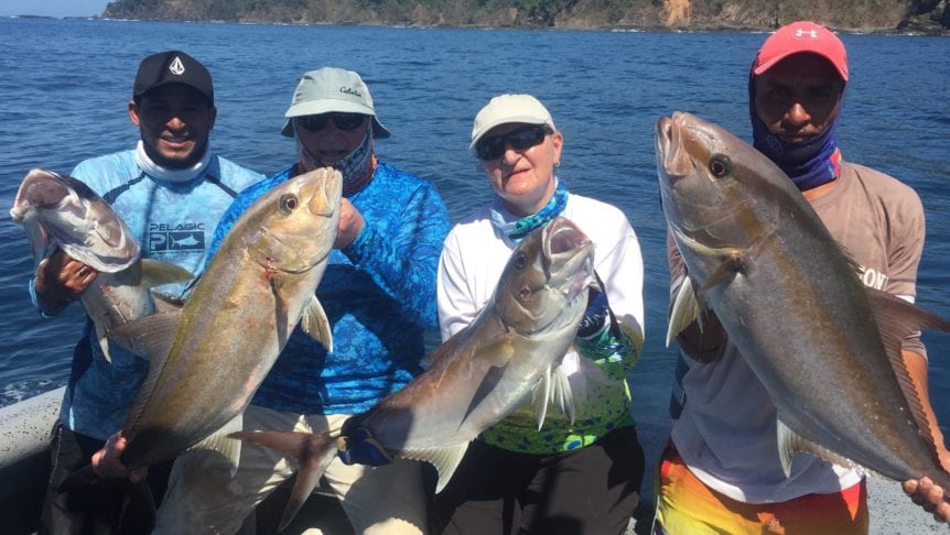 crew and guests with amberjack caught on coiba island