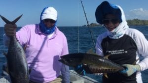 guest and his daughter with tuna caught inshore fishing tuna coast panama while on panama fishing vacation