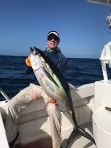 guest with nice size yellowfin tuna caught fishing tuna coast in panama dry season during a panama fishing vacation