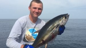 young guest pictured with tuna he caught while on panama fishing vacation
