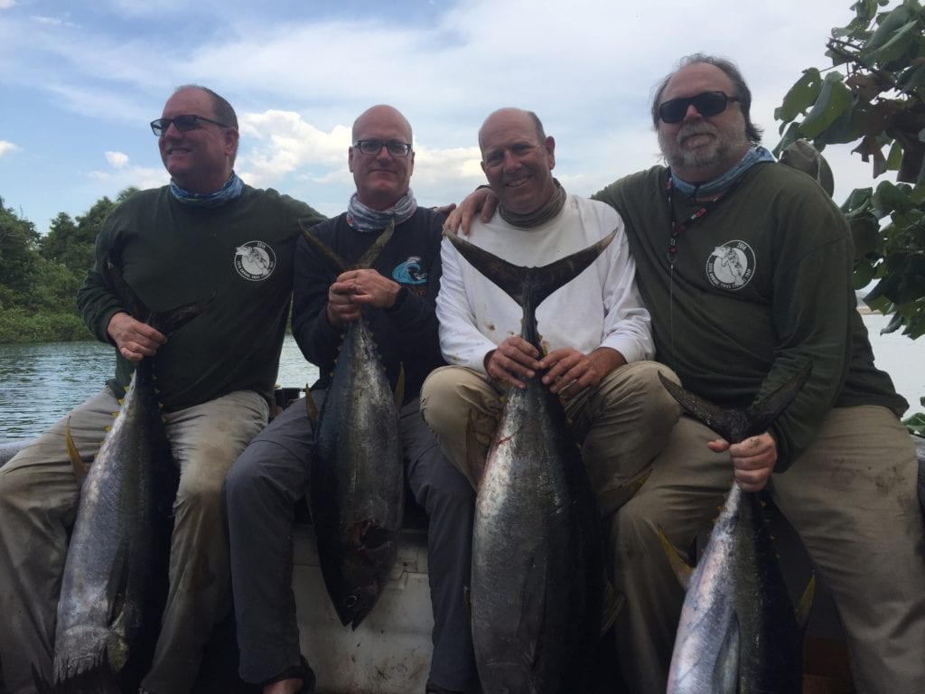 the group photo with some of their catch while on a fishing vacation in panama