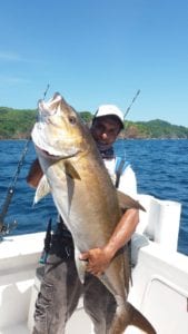 Captain Miguel with a nice amberjack caught while jigging reefs near Cebaco Island