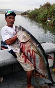 captain miguel with large tuna caught with CAF group