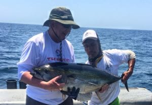 cfa group with tuna caught on fishing vacation
