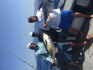 corey and craig morris with two tunas caught while fishing panama
