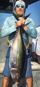 corey morris with tuna caught while fishing with el rio negro sport fishing lodge